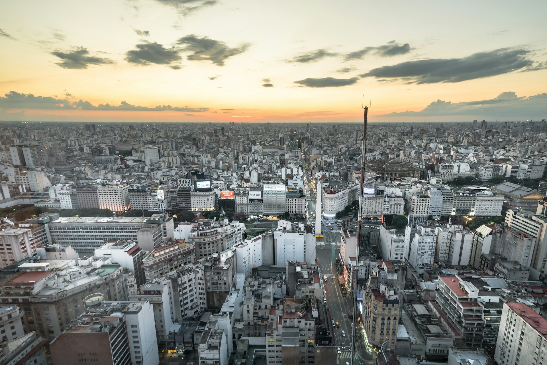 Aerial view of the Buenos Aires skyline with high-rise buildings at sunset